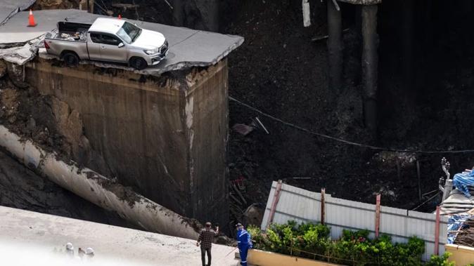 Road Collapse in Bangkok Creates Massive Sinkhole, Evacuations Ordered